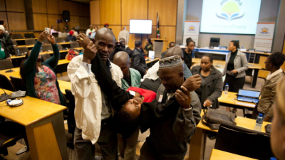 The widow of a slain miner collapses during the Marikana inquiry this week (PHOTO: Madeleine Cronje, M&G)