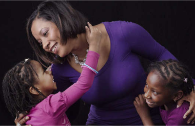 Genelle Guzman-McMillan with her daughters.
