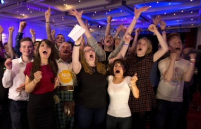 Supporters for the Scottish independence referendum celebrate a result at a No campaign event at a hotel in Glasgow, Scotland, early Friday, Sept. 19, 2014.