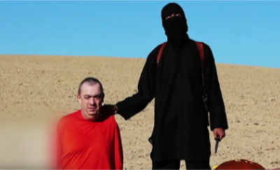 A screenshot from a video purportedly of the beheading of British hostage Alan Henning.