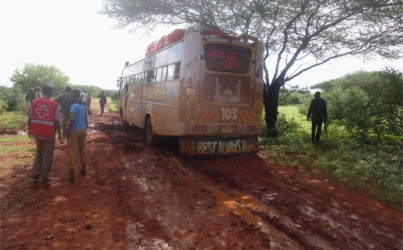 Rescue workers walk near a Nairobi-bound bus that was ambushed outside Mandera town, near Kenya's border with Somalia and Ethiopia, November 22, 2014. Somalia's al Shabaab insurgents said they were behind the bus attack in northeast Kenya that killed 28 people on Saturday, saying it was in retaliation for raids on mosques in the port city of Mombasa. Three of the group led out to be killed saved their lives by reciting verses of the Koran for the militants, a local security official said. (PHOTO: Reuters).