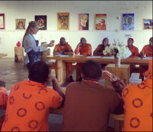 Johannesburg artist Lisa Crumpton conducts an art workshop with prisoners in Cape Town.