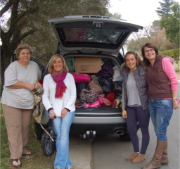 Lee, Karen, Ash and Niki with a carload of bags ready for delivery to a shelter.