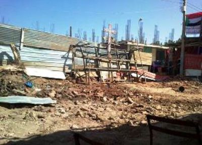 Only the cross remains standing in the evangelical church in Bahri torn down by the authorities Photo: World Watch Monitor