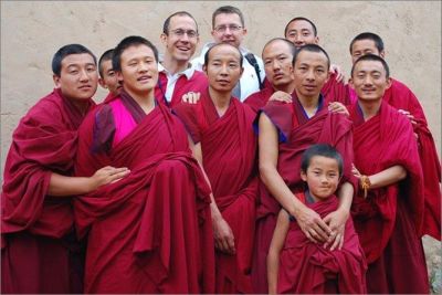 Making friends with Bhuddist monks in a village.