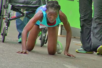Hyvon Ngetich -- crawling to honour in the recent Austin marathon.