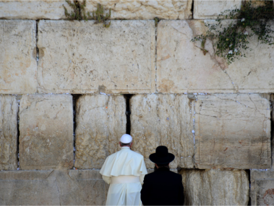Pope Francis prays during a visit to the Western Wall, Judaism's holiest site, in Jerusalem's Old City, earlier this week. While in the Holy Land, the pontiff extended an invitation to the presidents of Israel and the Palestinian Authority to join a prayer meeting at the Vatican.