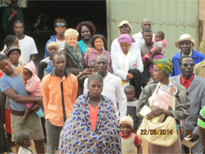 Erna Goedhard (blonde hair) with farm workers and local people in the Otjiwarongo area, Namibia.