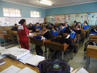 A Foxfire team member teaching life-skills at a school.