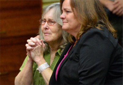 Susan Mellen, left, sits with her attorney Deirdre O'Connor, as she is exonerated of murder by Superior Court Judge Mark Arnold in Torrance, Calif., Friday, Oct. 10, 2014. Mellen spent 17 years in prison after being convicted of murder in the death of Richard Daly, a homeless man in 1997. The judge said Mellen had inadequate representation by her attorney at trial. The witness who claimed she heard Mellen confess, had a long history of giving false tips to law enforcement, according to documents in the case. Three gang members subsequently were linked to the crime, and one was convicted of the killing. (AP Photo/Daily Breeze, Brad Graverson, Pool ) (The Associated Press)