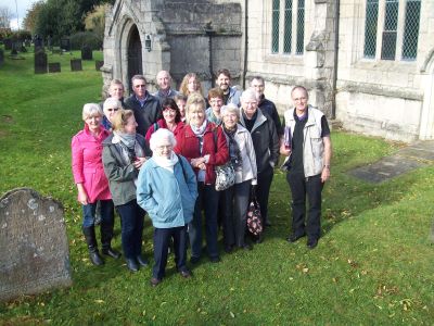 A tour group pictured at Scrooby Church sampling the delights of the new pilgrim trail.