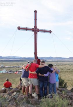 Prayer at the cross at a KMMC event. (PHOTO: David Stott)
