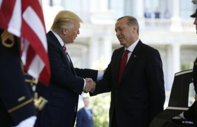 US President Donald Trump (L) welcomes Turkey's President Recep Tayyip Erdogan at the entrance to the West Wing of the White House yesterday. (PHOTO: Reuters) 